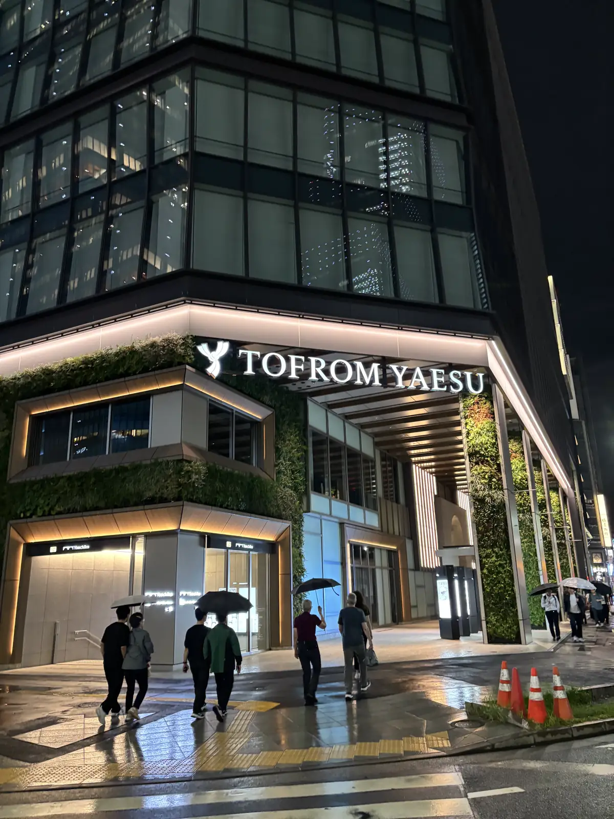 TOFROM YAESU TOWER exterior illuminated at night across a Yaesu intersection