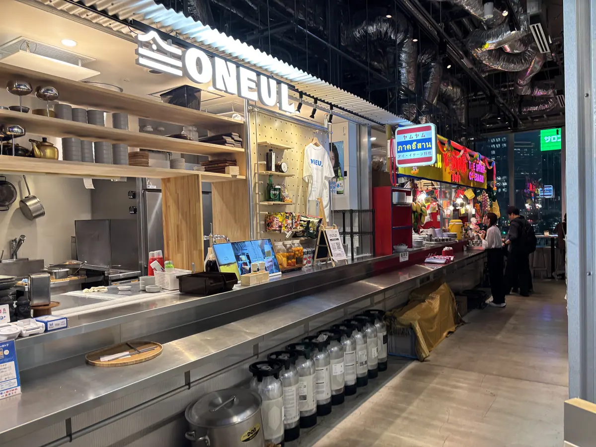 Open food counters and stools inside Yaesu Public