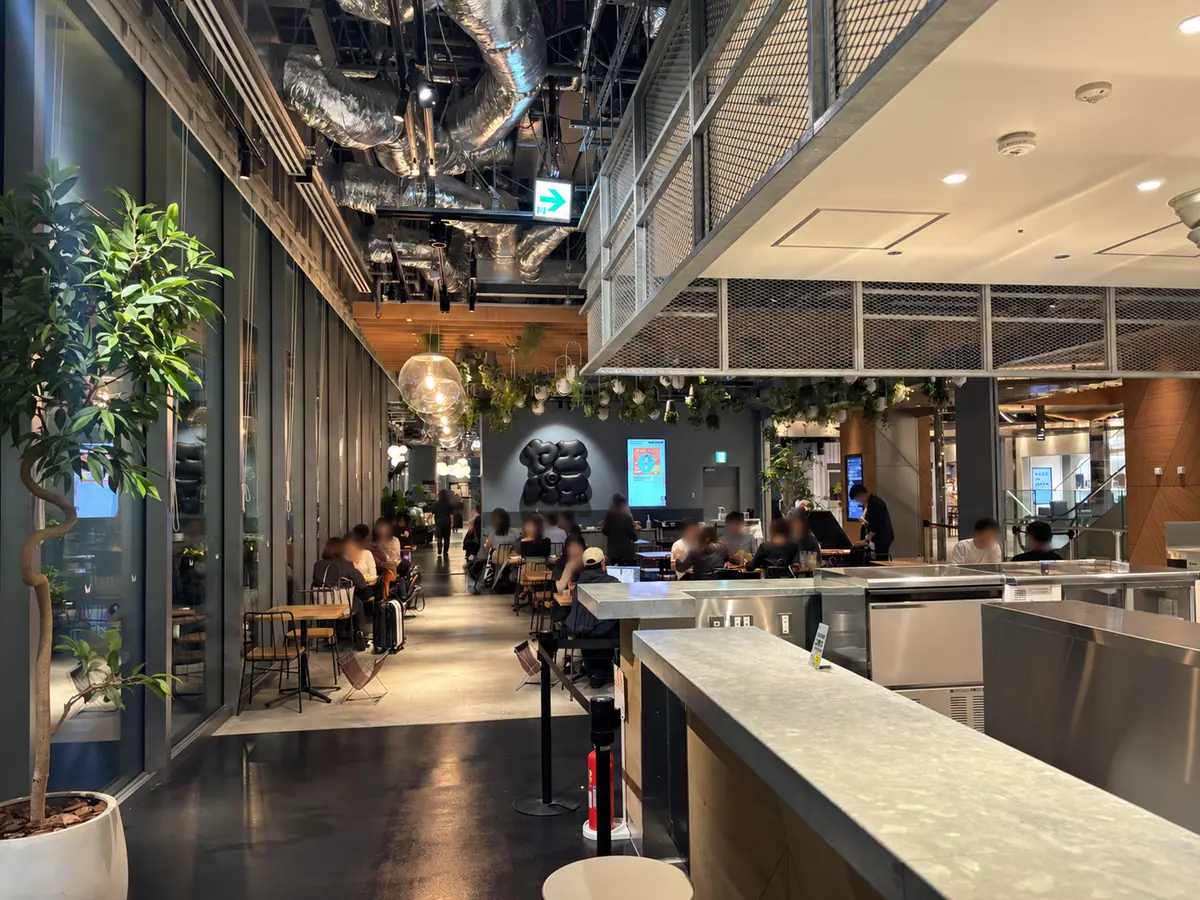 Counter seating and shared dining space at Yaesu Public