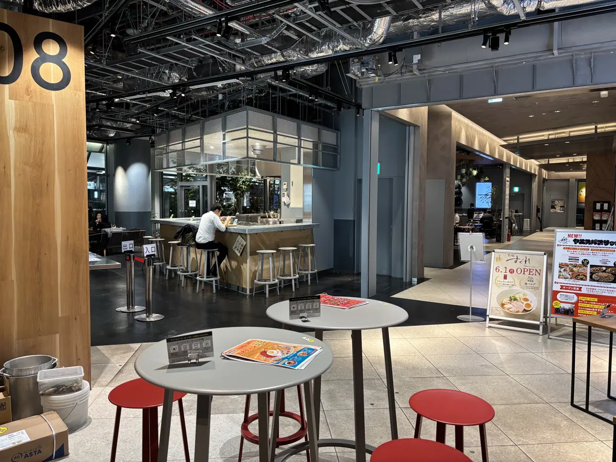 Small round tables in the open Yaesu Public food area